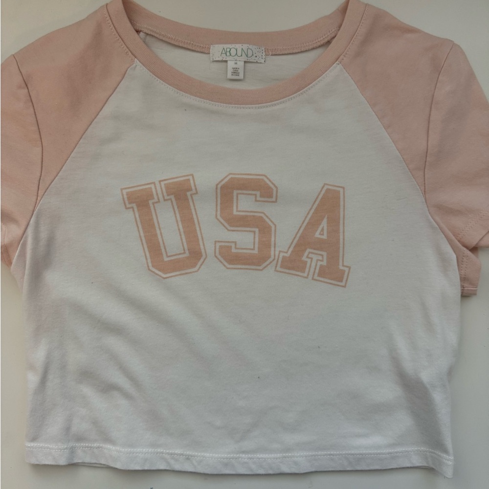 pink and white cropped usa shirt